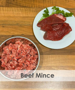 A bowl of raw dog food with beef
