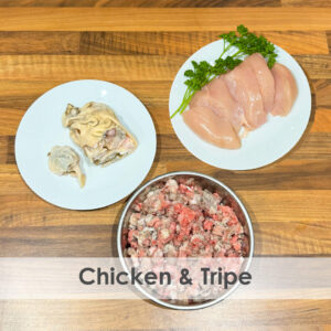 A bowl of raw dog food with chicken and beef tripe